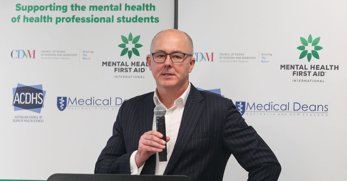 Mental Health First Aid International CEO Angus Clelland speaks to health professional students at the launch event